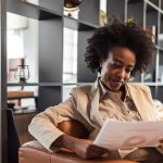 Employee woman with smile on spending time at work.